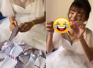 Cô dâu mỏi tay bóc phong bì và cái kết "ngã ngửa"