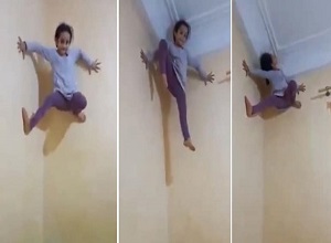 Cô bé trèo tường dễ dàng như người nhện gây sốc
